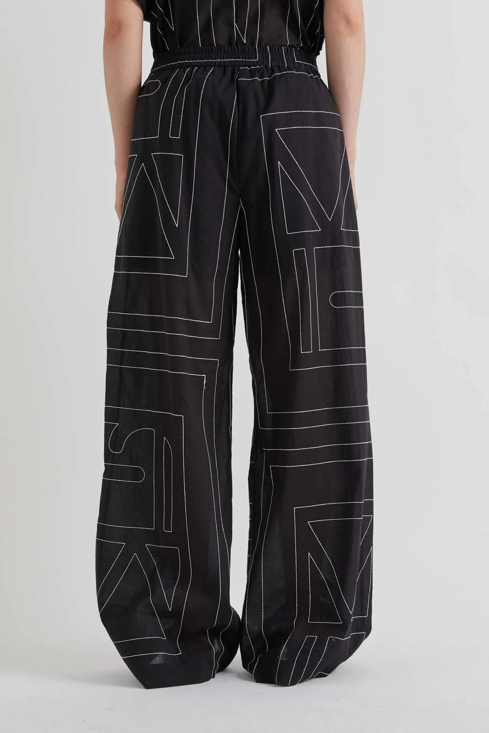 MEIMEIJ Trousers with All-Over Logo Embroidery