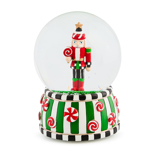 candy cottage nutcracker snow globe