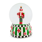 candy cottage nutcracker snow globe